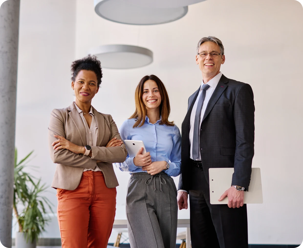 Business team posing confidently in office